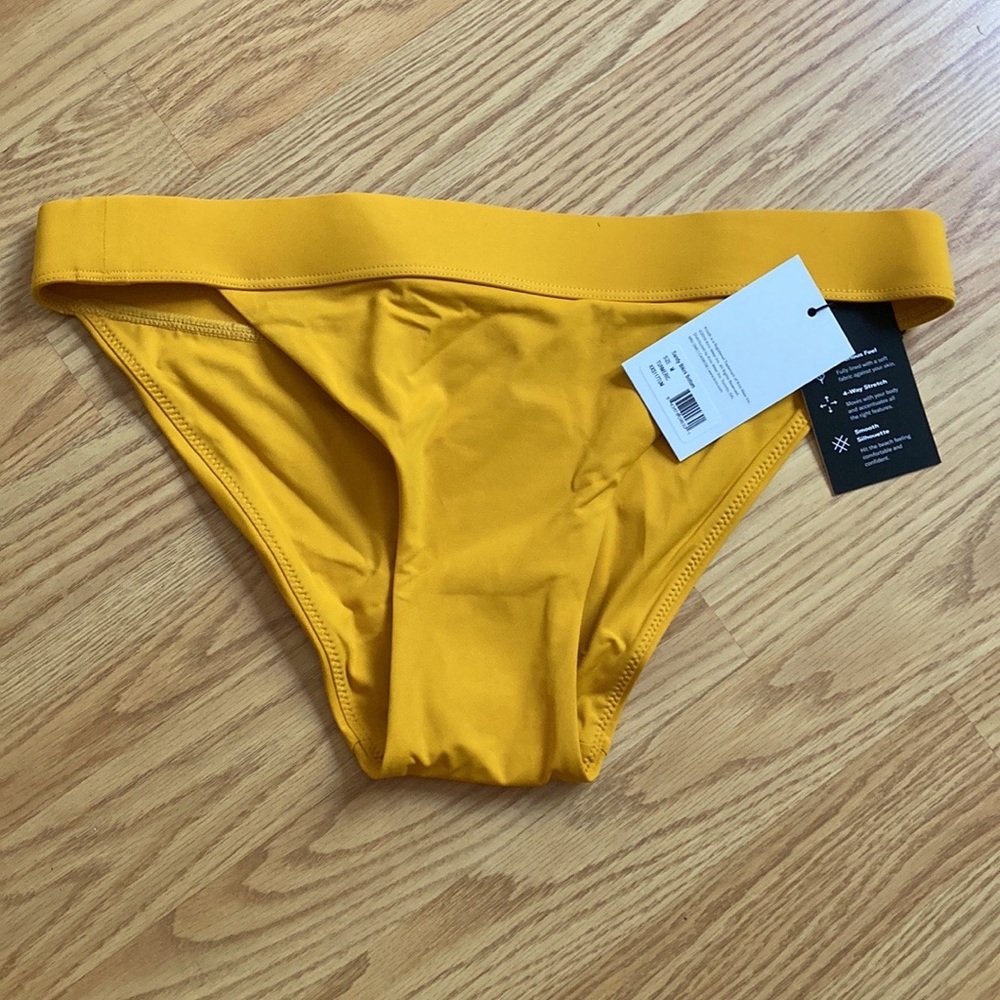 Knix mid rise bikini bottom turmeric M brand new with packaging